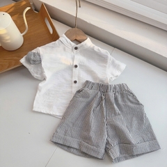 T553-Áo smi trắng đũi quần kẻ (05.14kg)