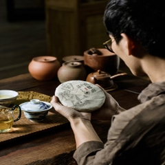 Phổ nhĩ sống Nam Nho Sơn bánh 200g 2023