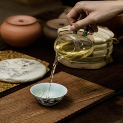 Phổ nhĩ sống Nam Nho Sơn bánh 200g 2023