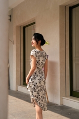 Đầm lụa lệch gấu