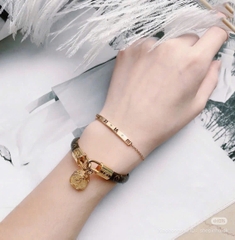 Vòng tay Louis Vuitton Tribute Petite Malle