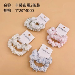 Bộ 2 dây buộc tóc vải, đóng thẻ.