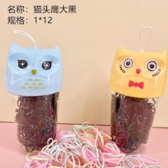 Dây buộc tóc hình cú đen nhiều màu.