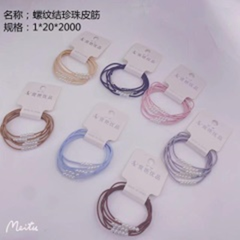 Dây buộc tóc ngọc trai kiểu nút xoắn.