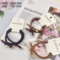 Dây buộc tóc kim loại.