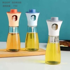 Chai xịt dầu thủy tinh  dạng ấn.