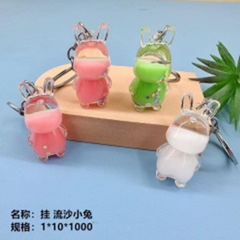 Móc treo thỏ nhỏ chứa cát chảy.