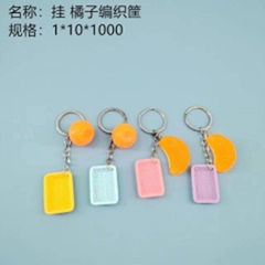 Móc treo giỏ đan hình quả cam.
