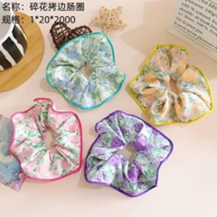 Dây buộc tóc hoa nhỏ viền.