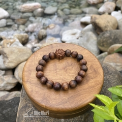Vòng tay gỗ Bách Xanh chìm già 10 ly thơm (đính hoa)