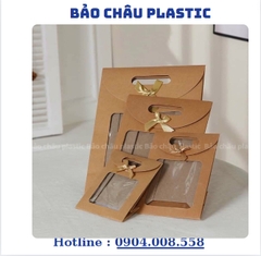 Túi hộp đựng món quà nguyên liệu giấy Kraft một mặt trong quãng có tay xách đính nơ
