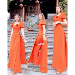 Áo dài trơn cổ vuông tay bồng đính hoa trên ngực trẻ trung - Áo Dài Đan Linh