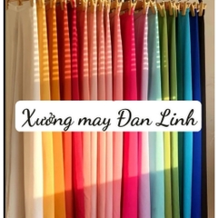 Mẫu áo màu đỏ may cách điệu tay von - Áo Dài Đan Linh