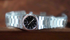 ĐỒNG HỒ NỮ TISSOT PRX QUARTZ BLACK 25MM T137.010.11.056.00