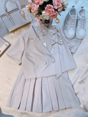 Set bộ chân váy ngắn xếp ly nơ ngực