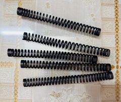 lò xo ép bánh xe chân vịt