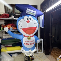 Rối Hơi Doremon vẫy tay quảng cáo Nhà Sách