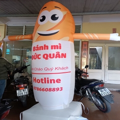 Rối Hơi vẫy tay quảng cáo nhà hàng Bánh Mì, Bánh Kem