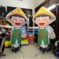 Rối Hơi vẫy tay quảng cáo cửa hàng Nông Sản