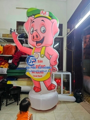 Rối Hơi vẫy tay quảng cáo cửa hàng Nông Sản