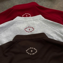 A29955- Áo sweater cổ zip thêu Born Again