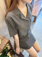 V3835 - V váy ngắn túi xéo thêu La