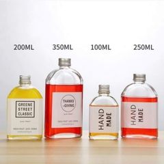 Chai thủy tinh dẹt miệng nhỏ chuyên đựng nước hoa quả