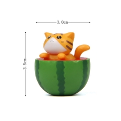 Tượng hình mèo ngồi trong nửa quả dưa hấu (4 mẫu)