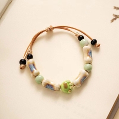 Vòng tay charm chân mèo màu xanh lá