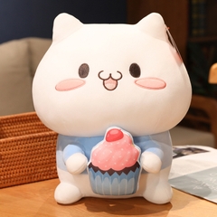 Mèo bông trắng cầm bánh