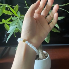 Vòng Bạch Ngọc Charm Sen Vàng