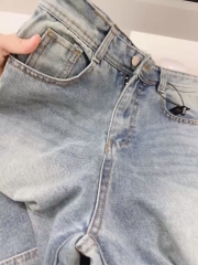 QUẦN JEANS NỮ LOE GẤU VẠT KIỂU