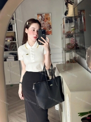 ÁO POLO CÁ SẤU TRẮNG VIỀN CAM NỮ SẴN