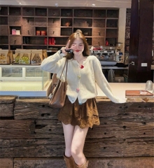 ÁO LEN 2 MÀU VÀNG TRẮNG CÚC TIM DÀI TAY NỮ