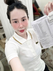 ÁO POLO CÁ SẤU TRẮNG VIỀN CAM NỮ SẴN