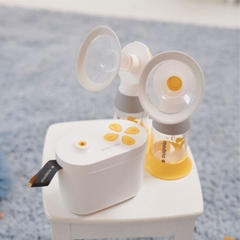 Máy hút sữa Medela Pump Instyle Maxflow (bản rút gọn). Tặng: 2 phễu silicon minipum & đệm hạ size + 1 bình trữ sữa 150ml + 2 áo hút sữa rảnh tay