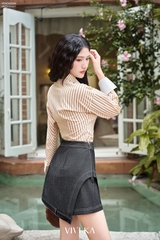 Quần váy Evelyn tà gập phom A viền chỉ nổi