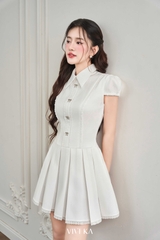 Đầm Carol tùng xếp ly phối nút