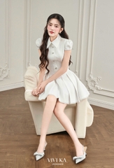 Đầm Carol tùng xếp ly phối nút