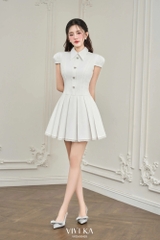 Đầm Carol tùng xếp ly phối nút