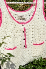 Áo knit kem phối hồng - cộc tay