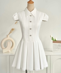 Đầm Carol tùng xếp ly phối nút