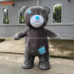 Mascot Hơi Gấu Xám Bị Thương
