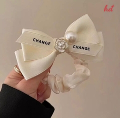 Cột Tóc Nhún Vải Nơ Hoa Trà Change Đính Trai 16600