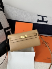 Kelly To Go Crossbody Wallet, Imported Epsom Leather, 0M Chai Beige & X9 Mauve Sylvestre Purple with Gold Hardware.