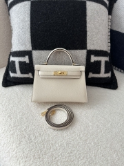 Kelly Mini II, Imported Chevre Goat Leather, I2 Nata Cream White with Gold Hardware.