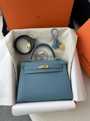 Kelly 25cm in imported Epsom grained leather, CC75 Blue Jean (denim blue) with gold hardware.