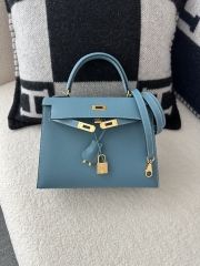 Kelly 25cm in imported Epsom grained leather, CC75 Blue Jean (denim blue) with gold hardware.