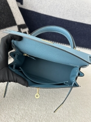Kelly 25cm in imported Epsom grained leather, CC75 Blue Jean (denim blue) with gold hardware.