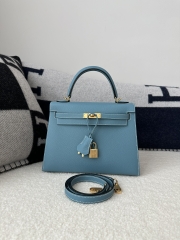Kelly 25cm in imported Epsom grained leather, CC75 Blue Jean (denim blue) with gold hardware.
